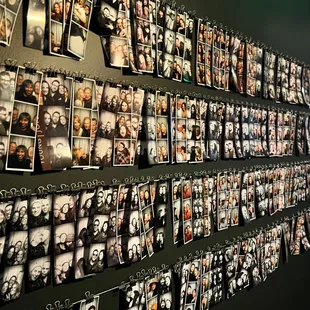 Photo strip wall along the hall.