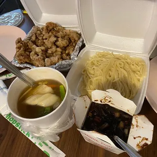 Jajangmyeon and tangsuyuk (black bean noodles and sweet and sour pork). Neatly packaged for take out orders