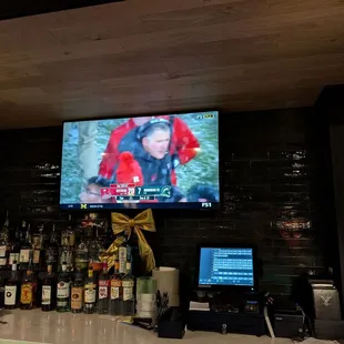 We were able to watch the game on the large TVs at the bar.