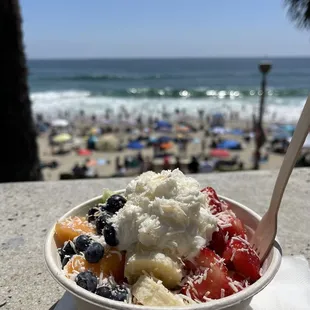 Awesome Fruit Bowl with shaved coconut and whipped cream!