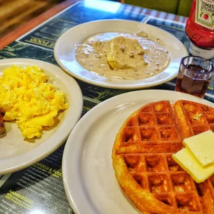 Waffles and eggs and sausage and biscuit and gravy