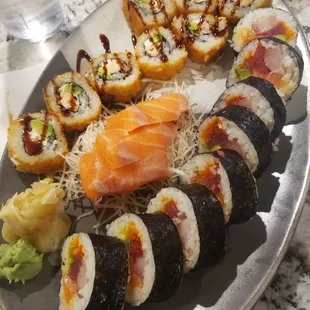 a variety of sushi on a plate