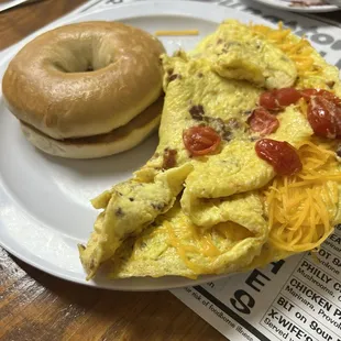 Build Your Own Omelet - bacon and tomatoes with a bagel