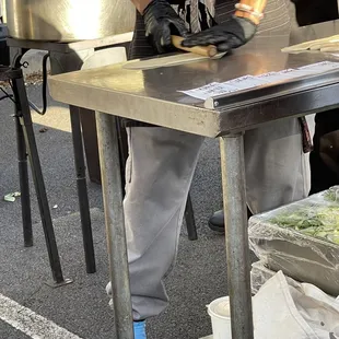 Chef rolling out the noodle