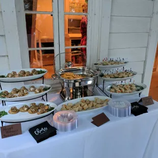 Appetizer spread for a pool-side rehearsal dinner