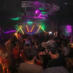 a crowd of people at a party