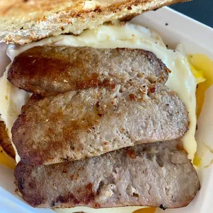 Sausage egg cheese on everything bagel