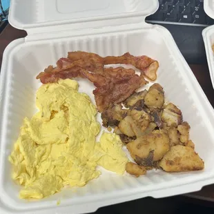 2 Eggs, Home Fries, Toast and a side of bacon