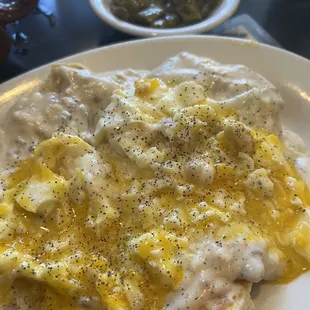 Biscuits with Sausage Gravy, over easy eggs and roasted hot peppers (in small dish)...sprinkled those on - amazing