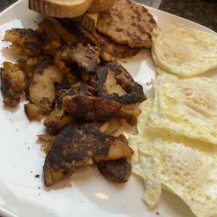 Over medium eggs, turkey sausage and potatoes
