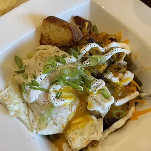Mexicali bowl: chili on top of potatoes, with over easy egg