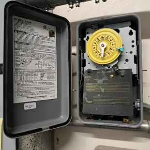 Parking Lot Light Timer Service and Repair offered by Your Neighborhood Handyman.