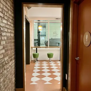 a view of a kitchen through a doorway