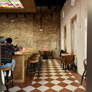 a man sitting at a bar