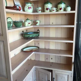 Custom made pine corner bookshelves with hand forged pulls