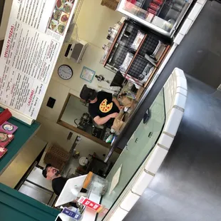 a man preparing food in a kitchen
