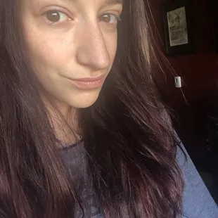 My hair turned out black with a hint of red after my first appointment. Obviously she would need to fix this.