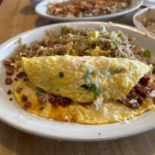 an omelet with bacon and green onions