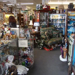 View looking inside from the front entry, front desk &amp; register on the left.