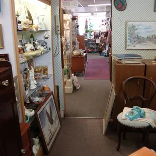 Looking towards the front desk &amp; windows, view from the back.