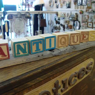 Spelled out with vintage wooden kids blocks, of course!