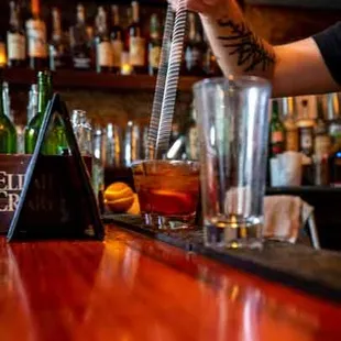 a bartender preparing a drink
