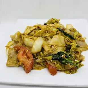 a plate of stir fried vegetables