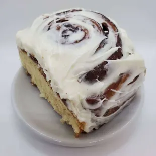 a cinnamon roll on a plate