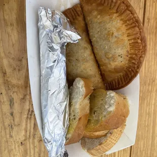 Empanada, chicken pinchos and garlic bread