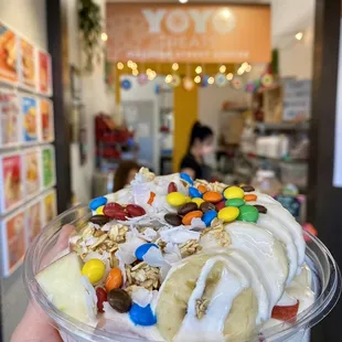 Bionico (bananas, apples, papayas, cantaloupes w/ granola, coconut flakes, and m&amp;m)