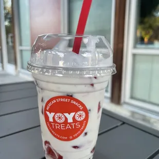 Fresada (fresh strawberries with special sweetened cream sauce, and topped with whipped cream and a maraschino cherry).