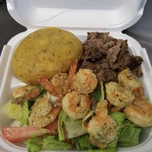 Our famous surf and turf with mofongo (shrimps and skirt steak)