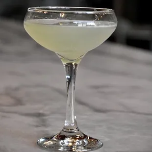 a close up of a cocktail glass