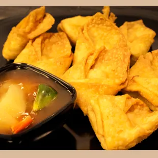 Cream Cheese Wontons with homemade sweet and sour sauce