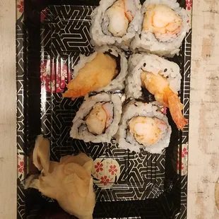 a plate of sushi on a table
