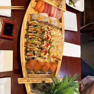 Volcanoe roll, Sunshine Roll, salmon lover roll, Spicy Tuna Roll, Christmas roll, Sushi Deluxe
