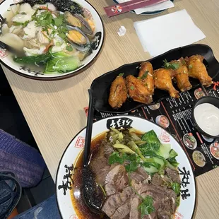 Seafood noodle soup, Shicuan beef noodle soup &amp; fried wings with garlic hot sauce