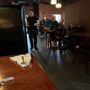 Inside view. A bit dark for my taste. Tables &amp; chairs have seen better days