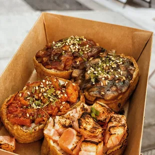 Clockwise: spicy mushroom, bulgogi mushroom, torched salmon, spicy chicken