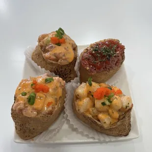 Two Left: Spicy Salmon Top Right: Grounded Tuna Bottom Right: Creamy Scallop