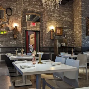 a dining room with a chandelier