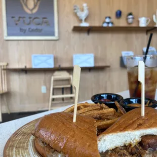 Cubano Sandwich (hold the pickles, chipotle mustard on the sidse) with yuca fries
