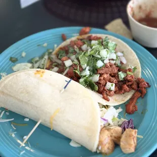 Al pastor and mahi mahi tacos