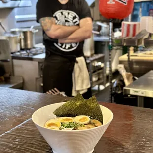 Spicy Miso, with an extra egg and the owner Mike  in the background.