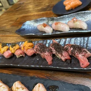 Seared salmon, amberjack, super toro, toro flight, king salmon