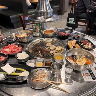 Full table.  Two orders of the top tier dinner menu