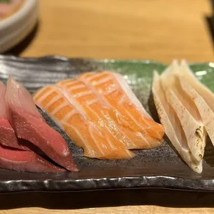 Sashimi assortment. From left to right: Yellowtail, Salmon Belly, Albacore