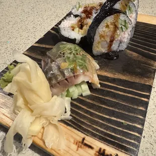 Shime Saba (cured mackerel) up front and tempura sushi in the back