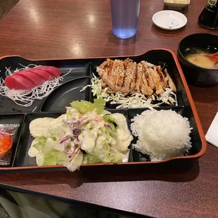 Chicken teriyaki and sashimi bento lunch