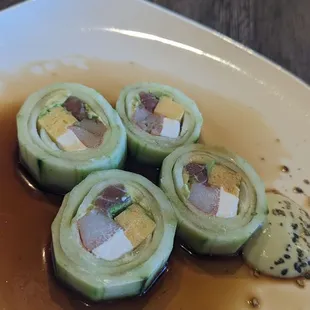 Kanisu - Appetizer from Sushi Bar Tuna, Avocado, Crab, Cream Cheese, Tamago wrapped in Cucumber.